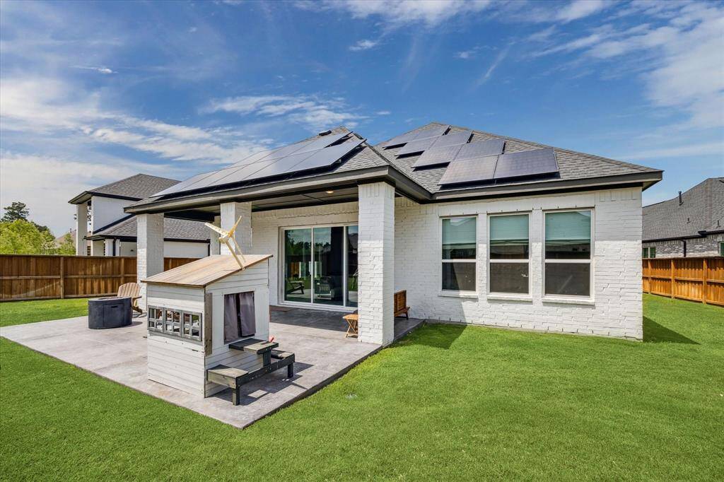 extended patio is perfect for summer barbecues and plenty of room in back for pets and kids