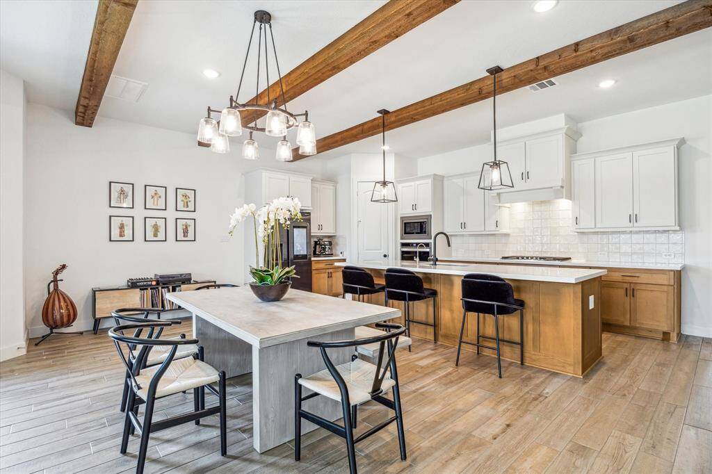 All new lighting from West Elm above dining table and kitchen island