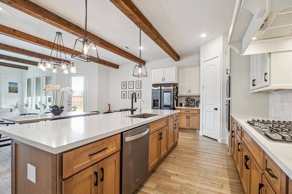 Farmhouse sink and new VIGO chrome faucet, double trash can pullout