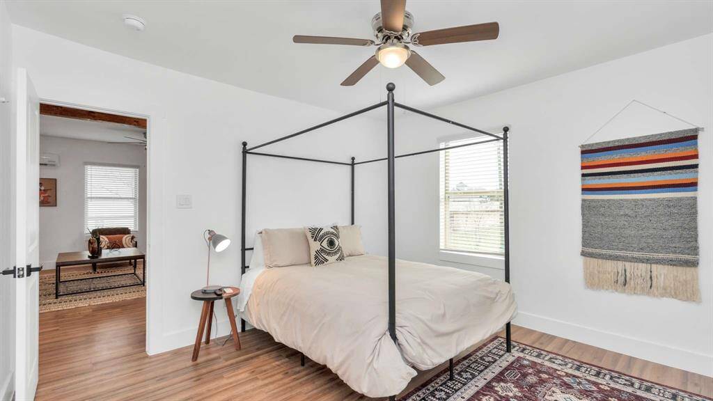 The primary bedroom has plenty of room for a king sized bed and more.