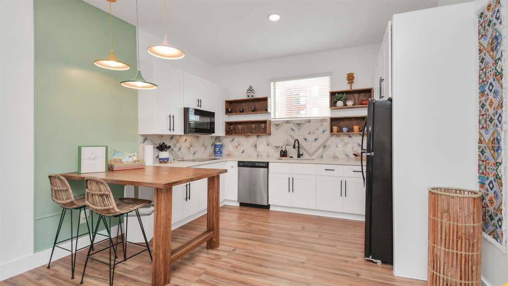 Looking towards the large eat in custom kitchen.
