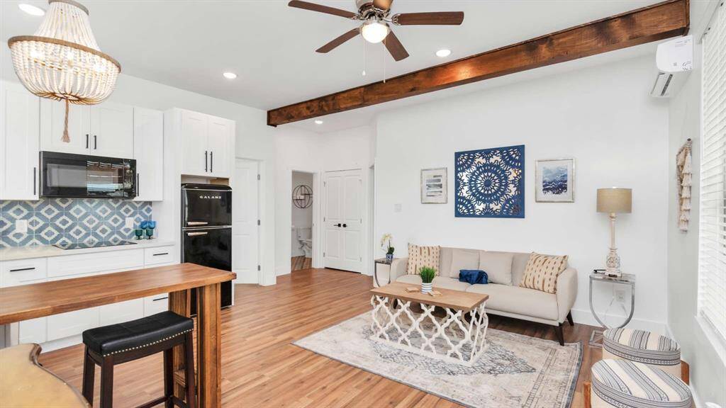 The open concept living room with beautiful wood accents.