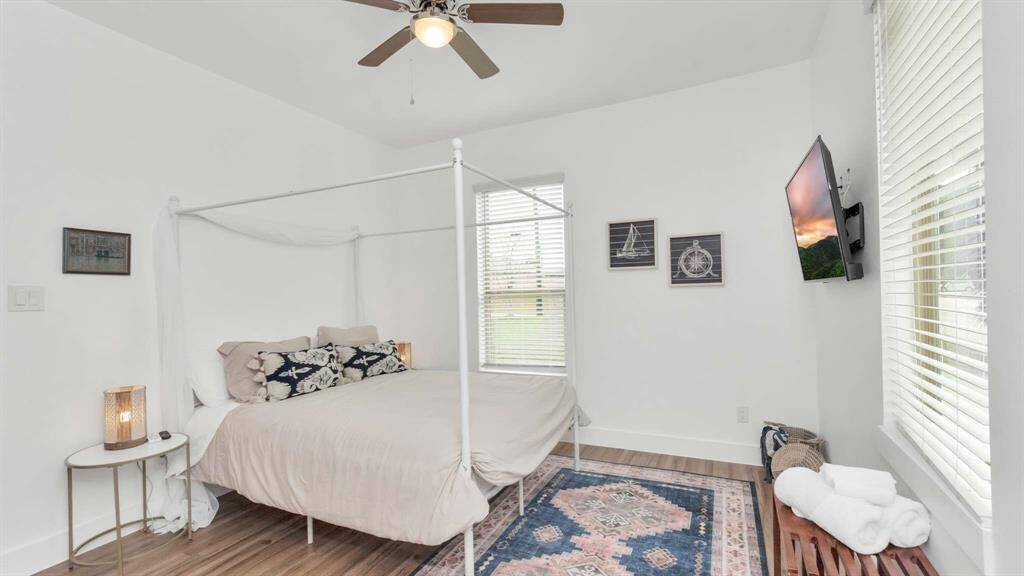 The primary bedroom has great natural light.