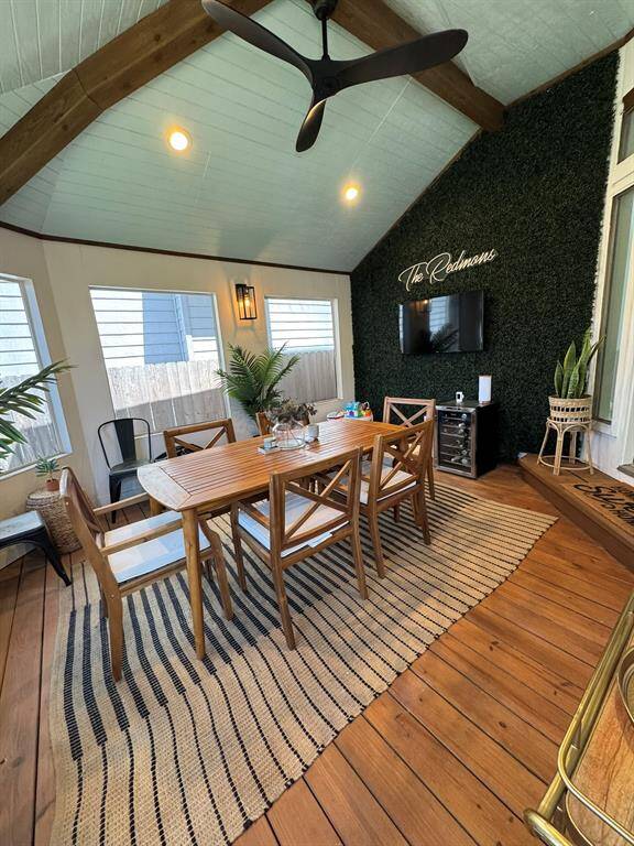 Large screened in porch with vaulted ceiling, lighting, fans and wired for TV