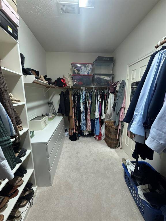 Huge walk in primary closet