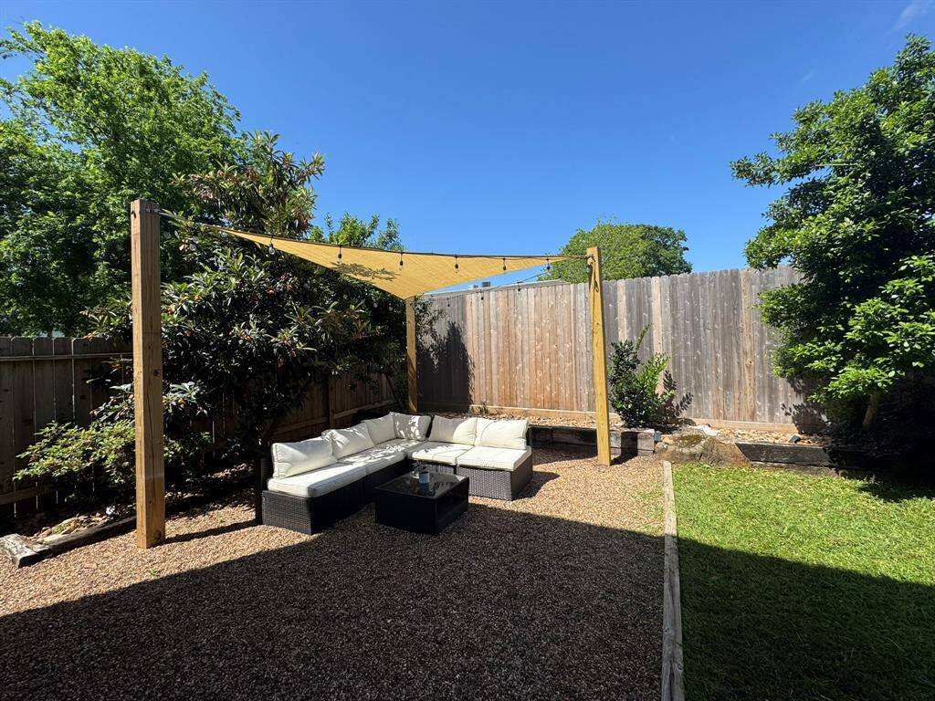 Backyard with shaded seating area