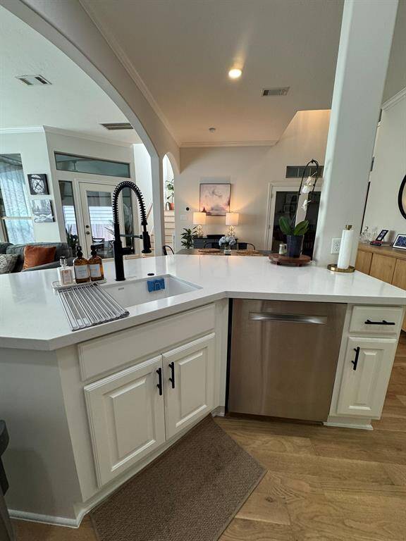 Beautiful kitchen featuring all stainless appliances and quartz countertop