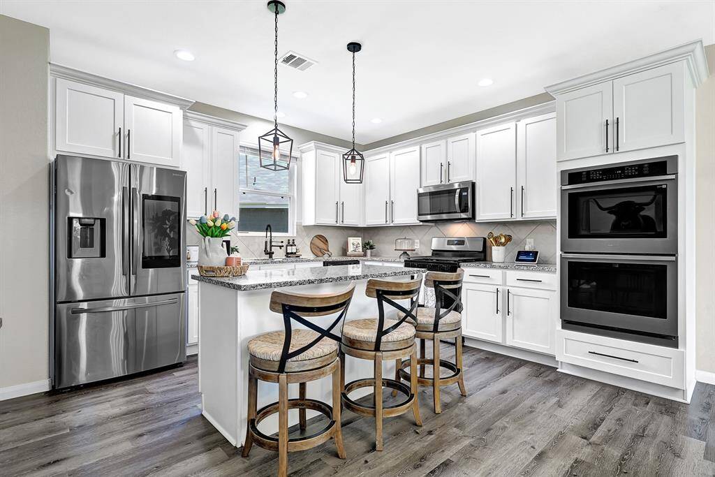 beautiful kitchen with double over & more storage