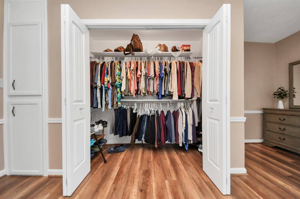 Huge walk in primary closet!