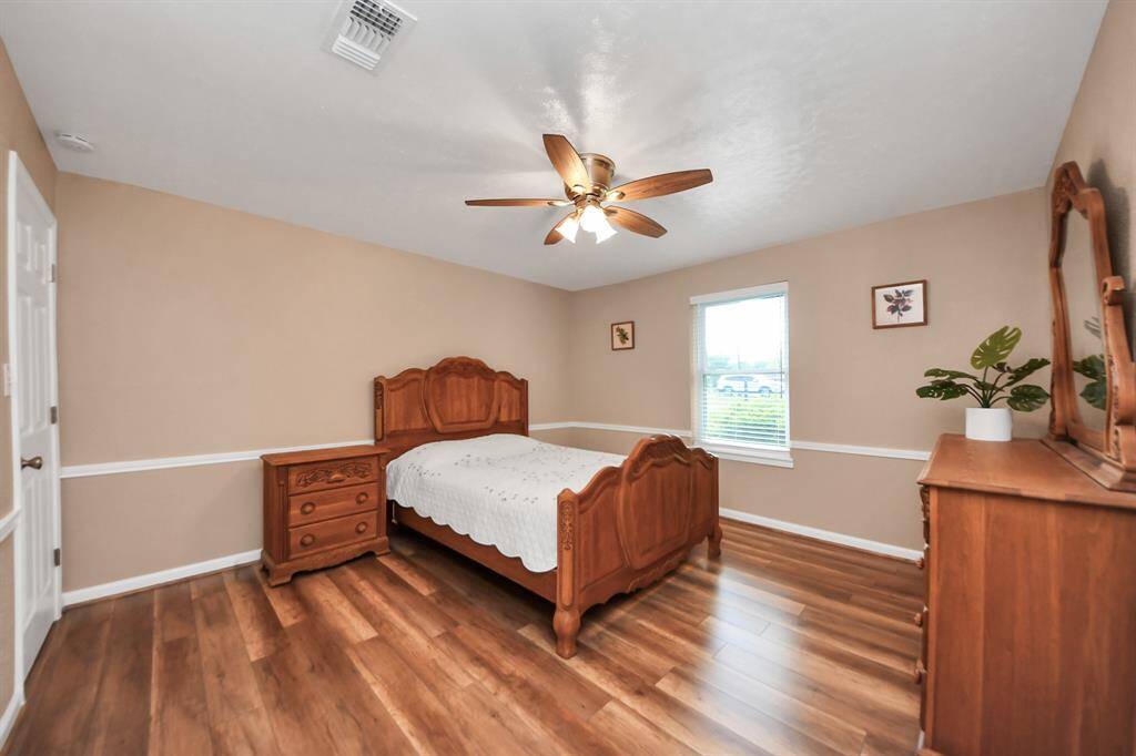 Another spacious secondary bedroom with large walk in closet.