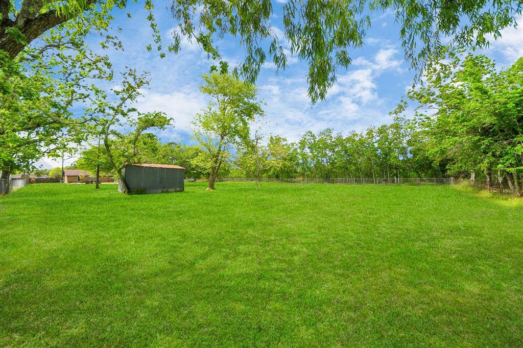 The extra land offers plenty of potential for expansion, gardening, or even additional structures.
