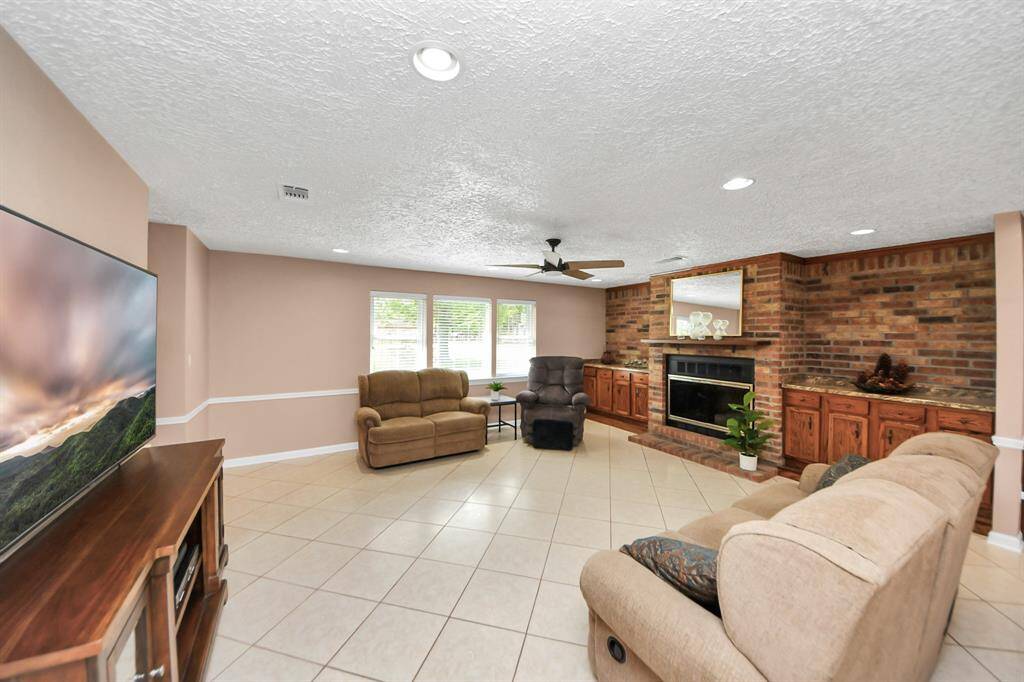 Another view of the living area with plenty of storage and natural lighting.