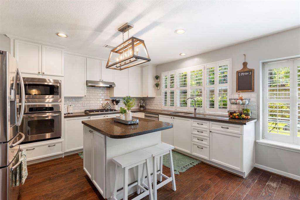 Gourmet kitchen with island.