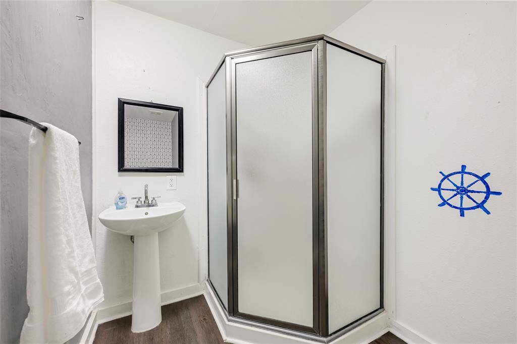 Secondary bath with shower.