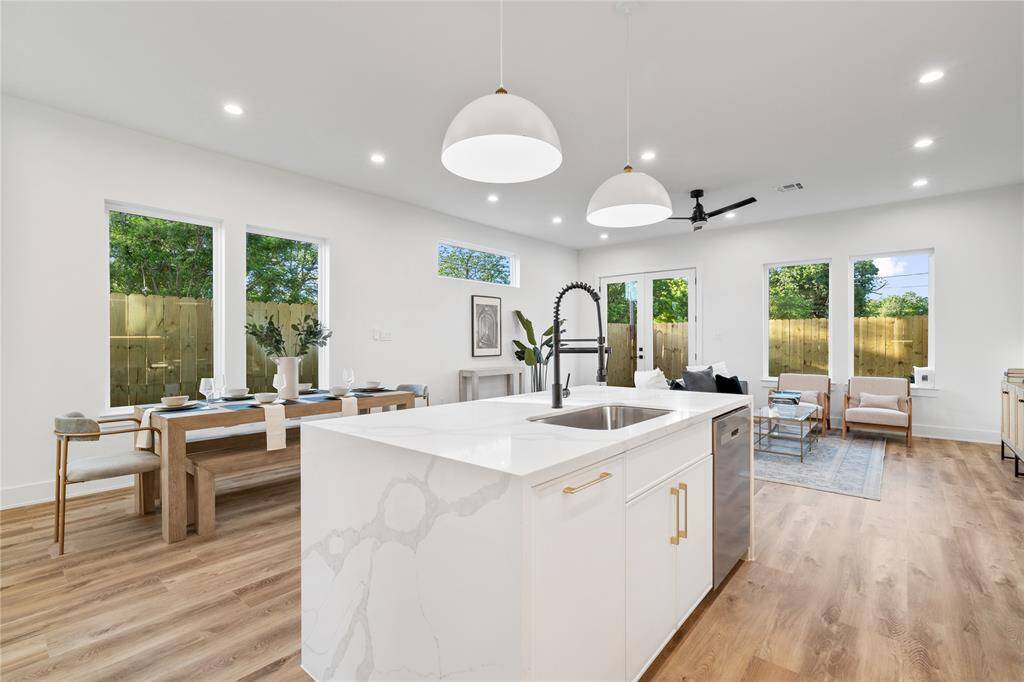 The space seamlessly connects to the dining area and kitchen, creating a perfect flow for entertaining