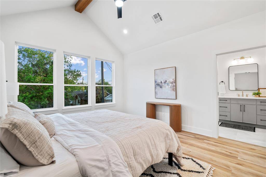The spacious layout provides room for a sitting area or workspace.