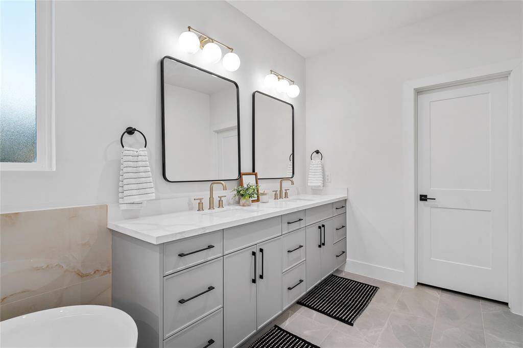 Soft lighting and modern finishes complete the serene retreat.