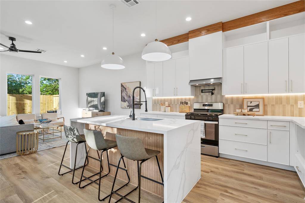 The open layout allows for effortless entertaining and connection between spaces.