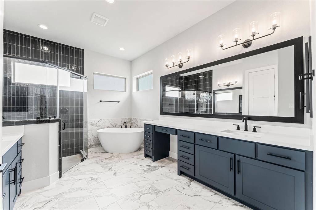 Separate Vanities and Freestanding Tub
