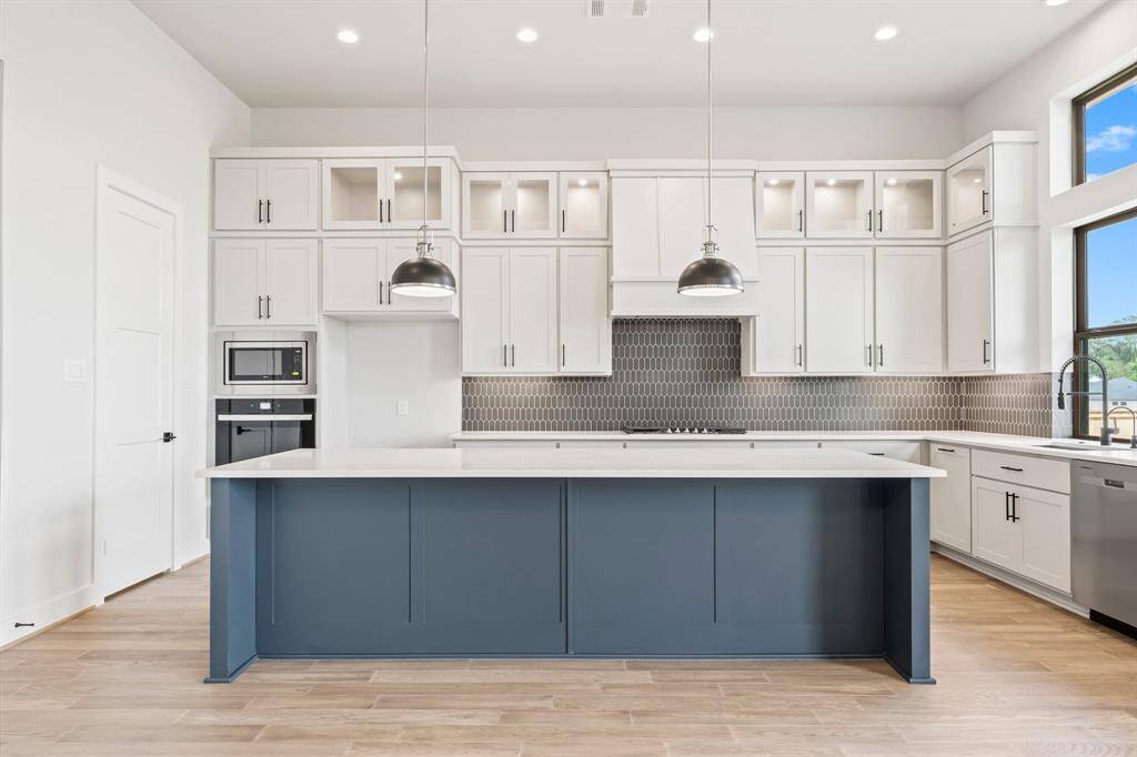 Gorgeous 2-toned Kitchen with Stacked Cabinets, Hardware, Under Cabinet Lighting, and So Much More!