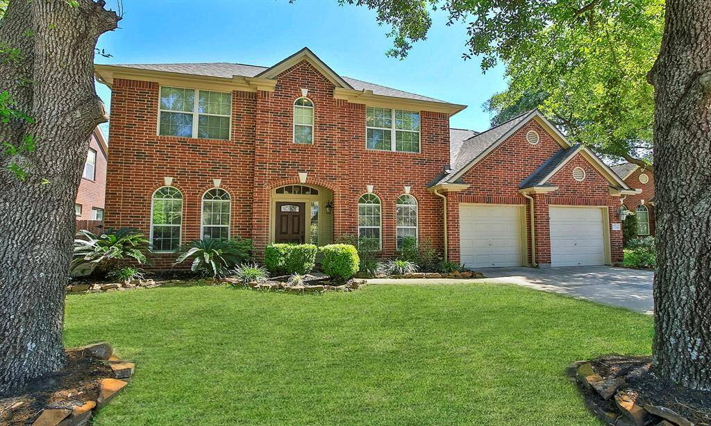 Charming traditional home nestled in a peaceful cul-de-sac, offering elegance and privacy.