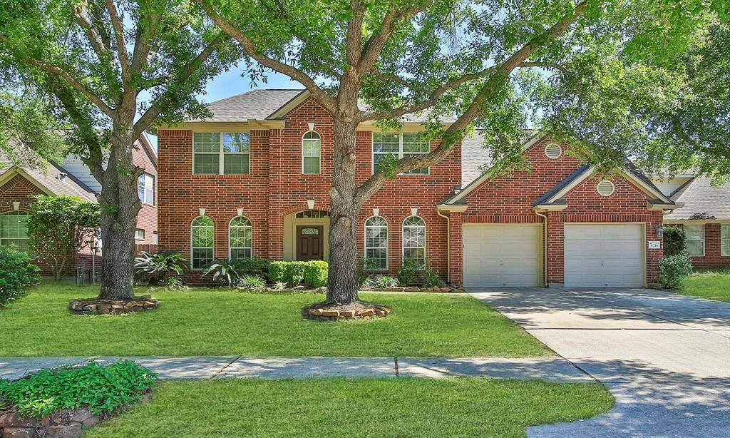 Spacious two-car garage with a convenient double driveway.