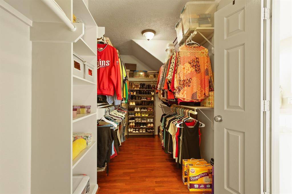 Expansive walk-in closet in the primary suite.