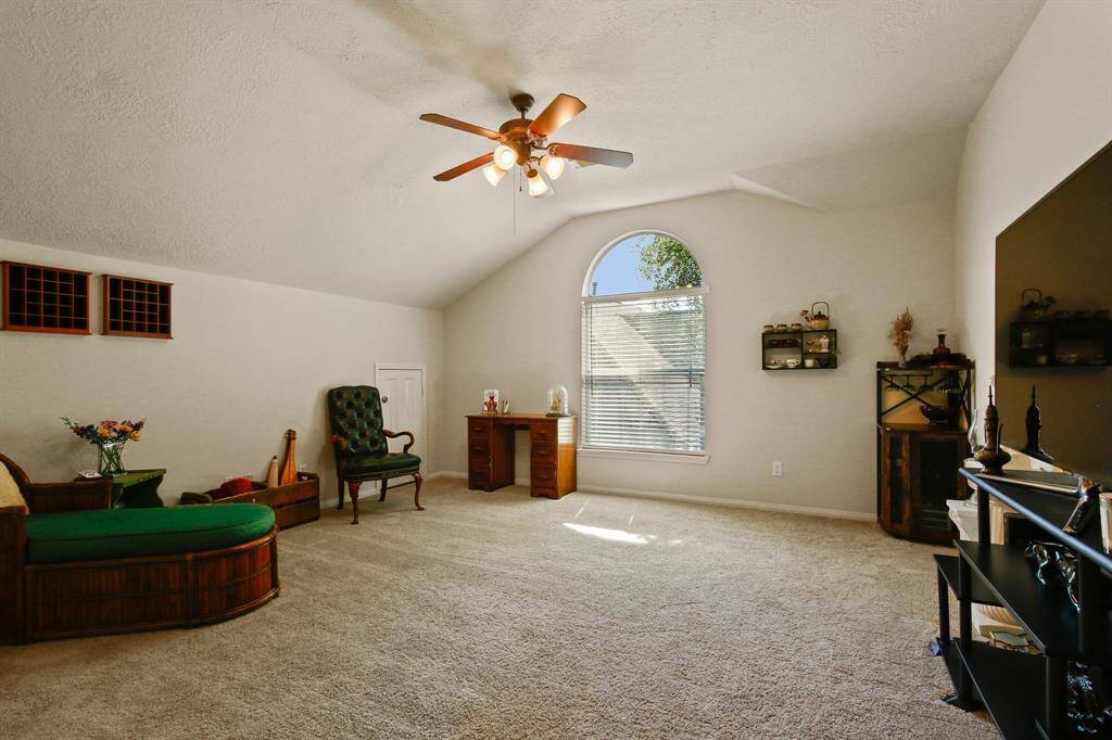 Upstairs entertainment room perfect for all your favorite activities.