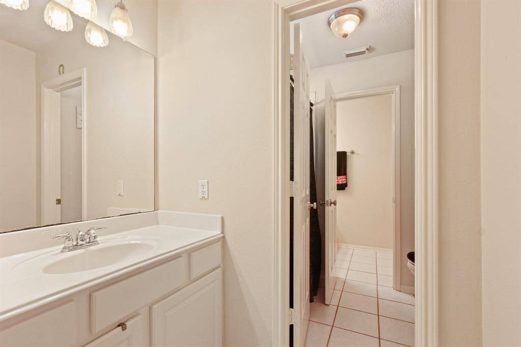 Convenient second-floor Jack and Jill bathroom for easy access and shared comfort.