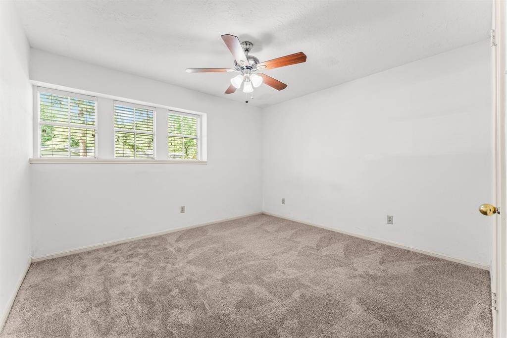 Bedroom #1 - All bedrooms feature ceiling fans and spacious closets.