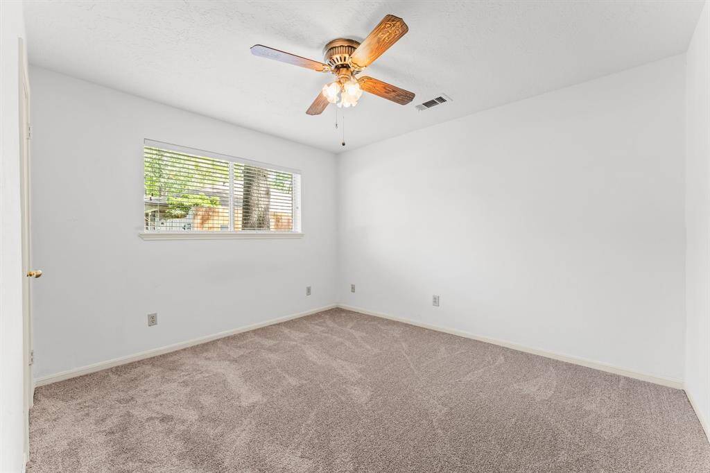 Bedroom #2 - All bedrooms feature ceiling fans and spacious closets.