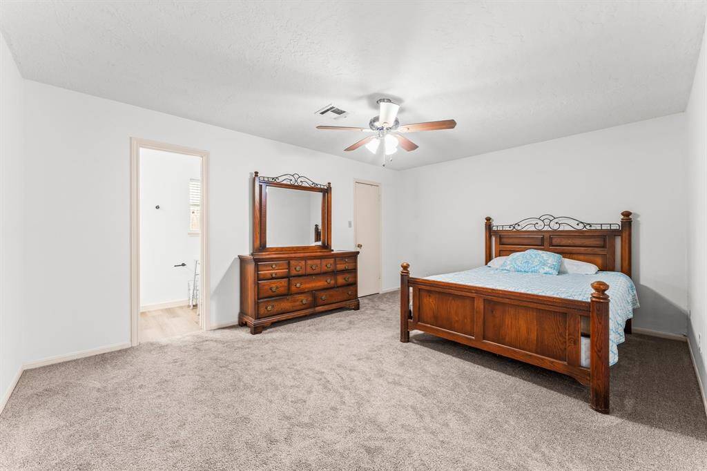 Primary bedroom features a private en suite.
