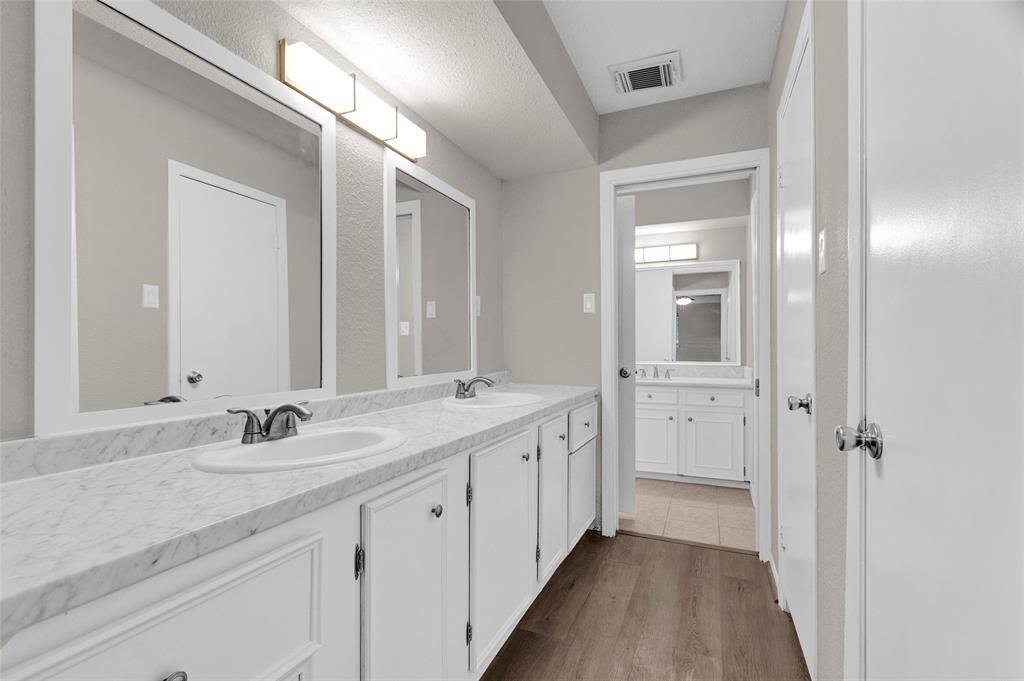 With your vanity to the left and two closets to the right, simply close the pocket door straight ahead and the walk-in shower and toilet become a full bath for the study/5th bedroom while maintaining your privacy while getting ready to face the day!