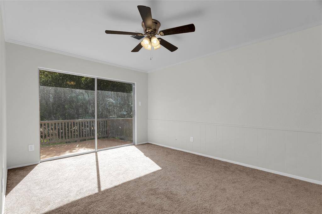 Step into serenity in this light-filled fourth bedroom featuring direct access to a private balcony—perfect for morning coffee or unwinding in the evening.