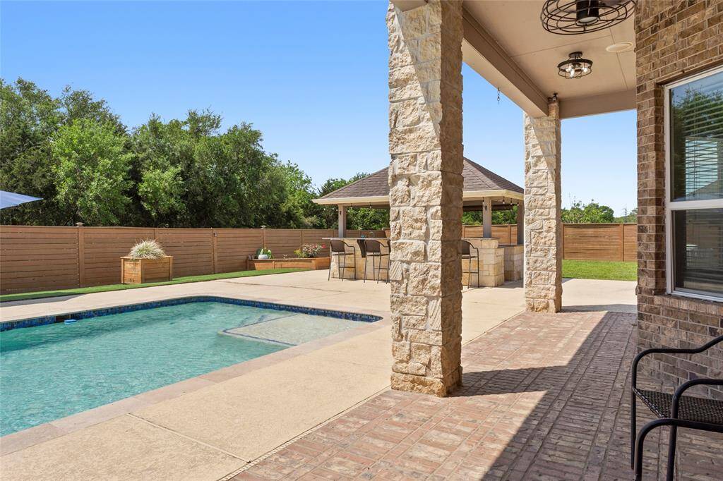 This backyard is perfect for entertaining friends and family.