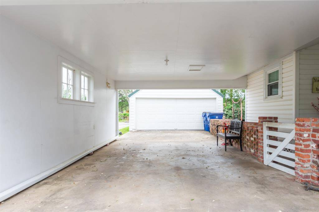 Additional covered parking on north side of house