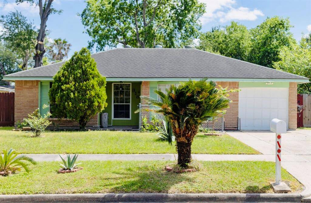 Brick veneer house with double car driveway