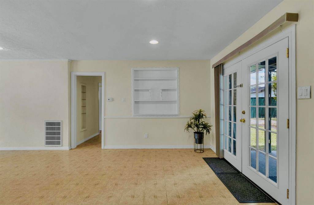 French Doors lead to the backyard
