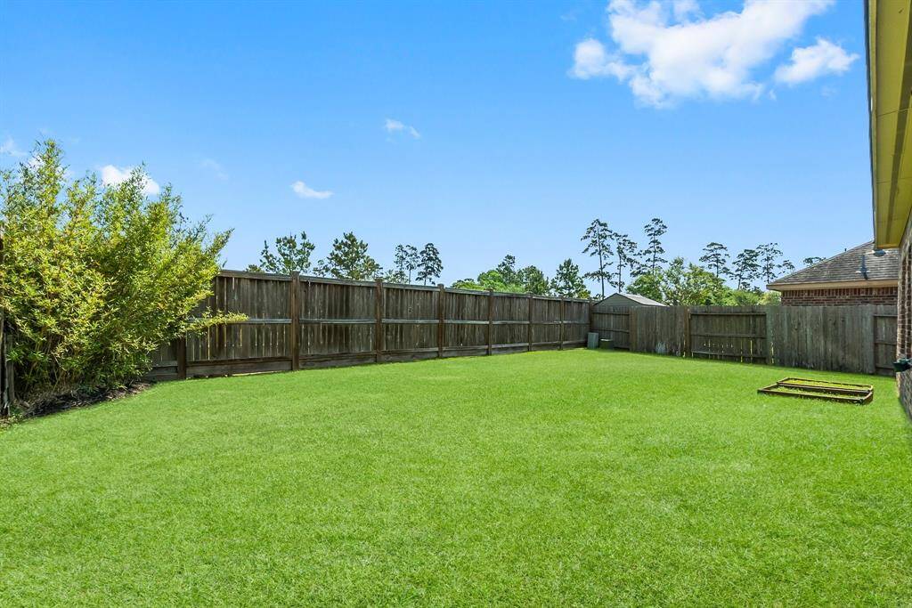 oversized backyard, clean slate for a playground set, pool and pets!