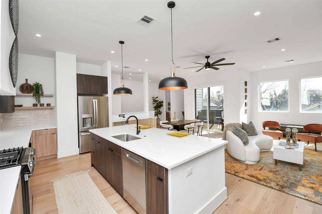 This kitchen is quipped with a gas range, high-efficiency appliances, and ample storage, it's perfect for everyday cooking and entertaining.