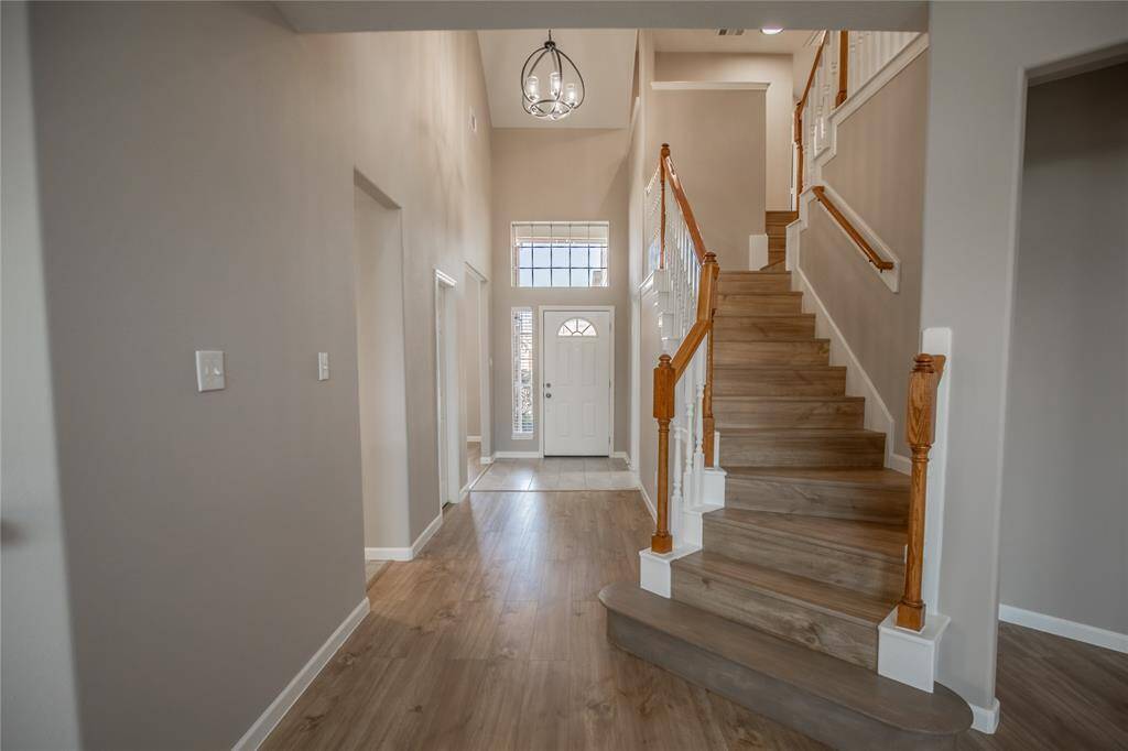 Updated stair case that matches flooring.