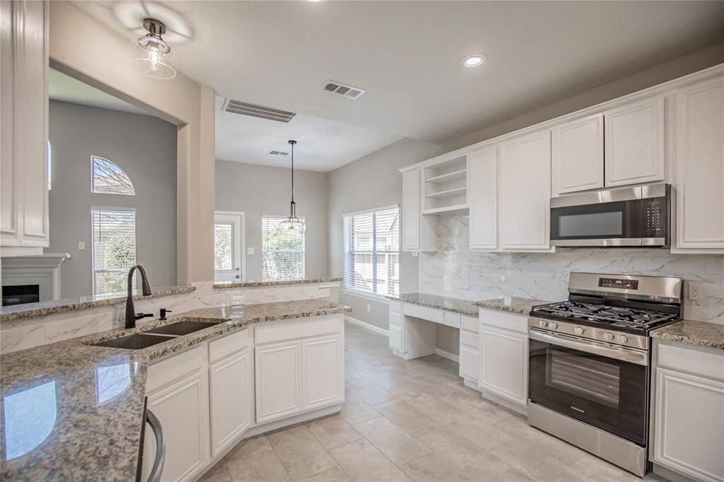 New granite and backsplash.