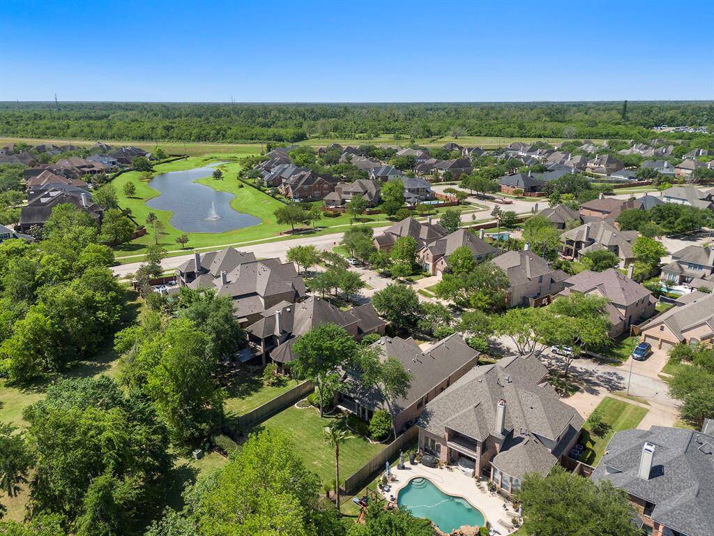 Nestled in a beautifully designed community, this home offers scenic views, lush greenery, and a peaceful pond. Experience the perfect blend of nature and modern living.