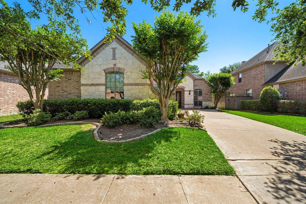 Charming home with a beautiful limestone exterior.