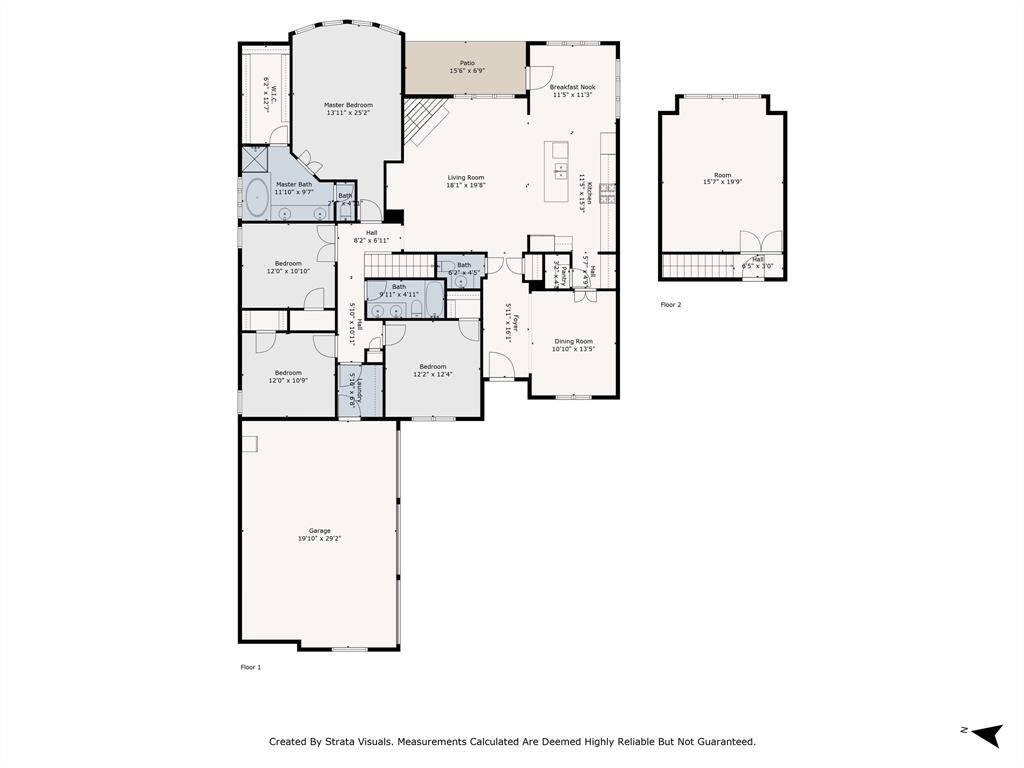 This photo shows a detailed floor plan of a multi-level home. The first floor includes a master bedroom with an ensuite, three additional bedrooms, two bathrooms, a spacious living room, dining room, breakfast nook, and a large garage. The second floor features a sizable additional room.