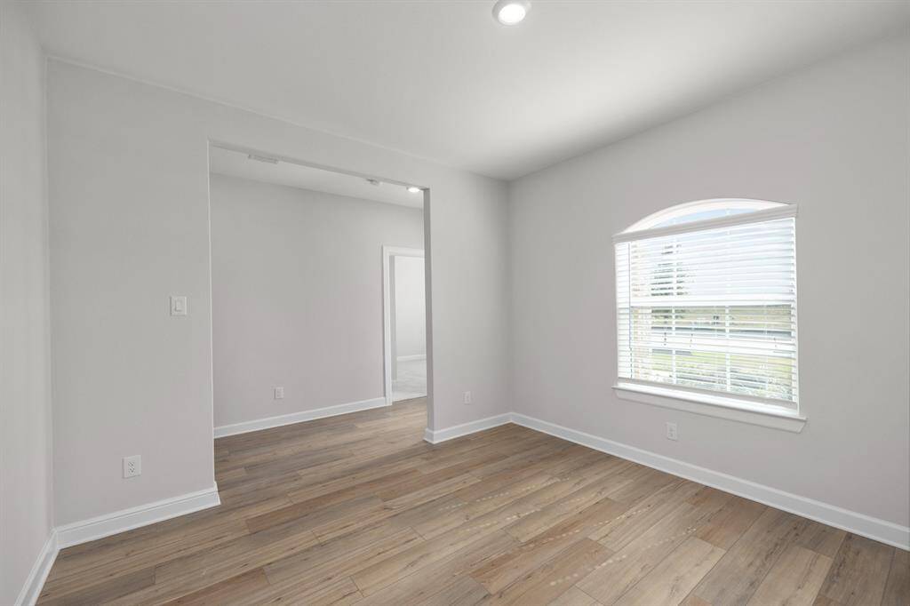 The formal dining room is located at the front of the home and is across the hall from the kitchen.