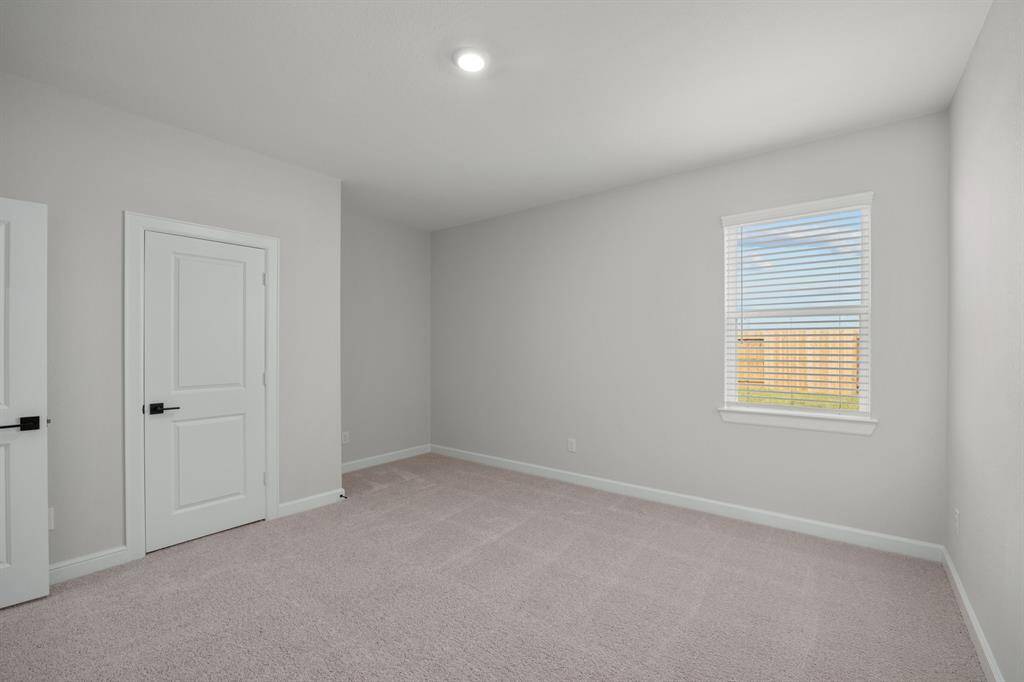 Each of the three secondary bedrooms are generously sized.