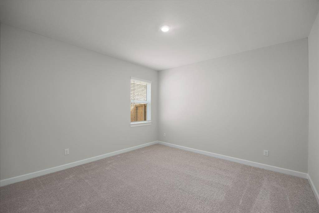 Each of the three secondary bedrooms are generously sized.
