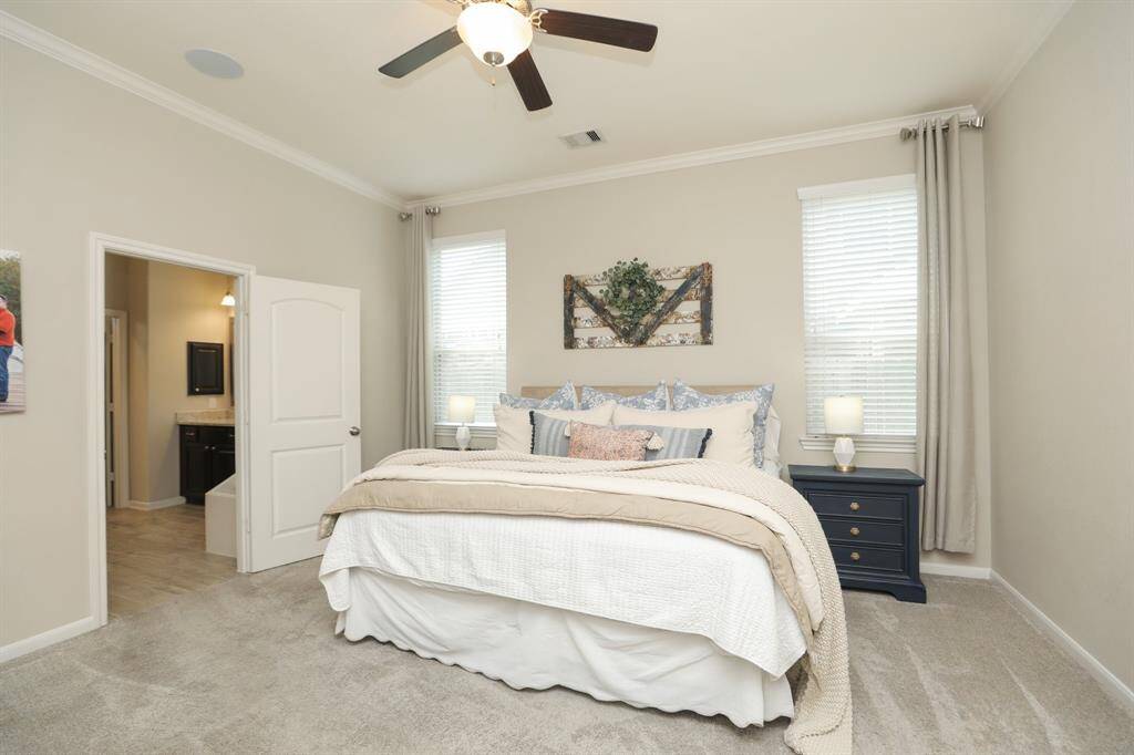 Come on in to the large primary bedroom on the 1st floor.