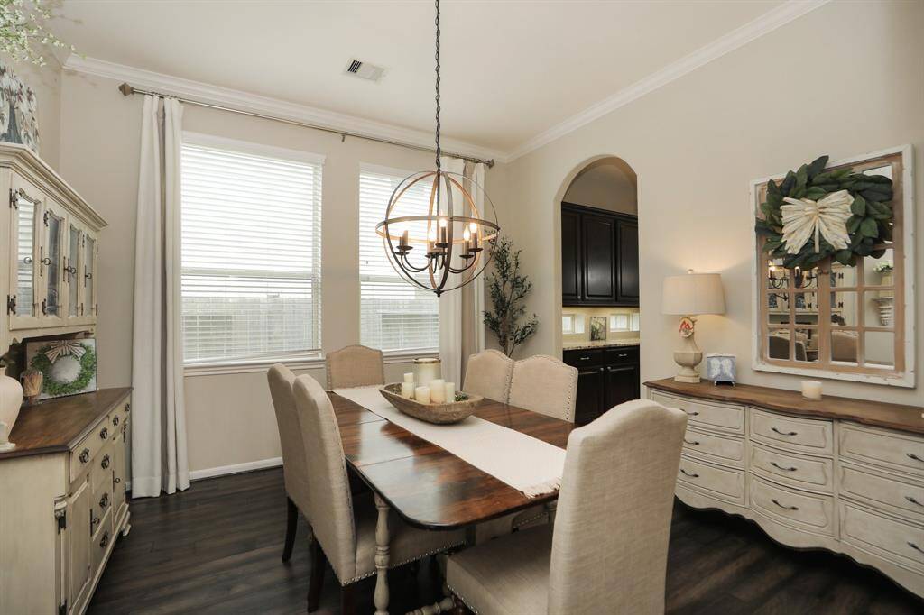 Open to the entry is a lovely dining room.  Makes so easy to entertain.